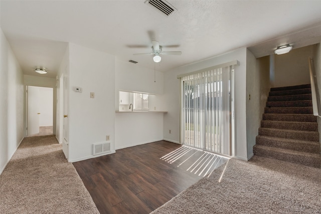 kitchen with electric stove, white cabinets, dishwasher, sink, and light wood-type flooring