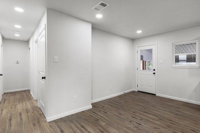 foyer with dark hardwood / wood-style flooring