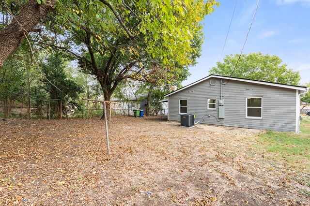 view of yard with central AC