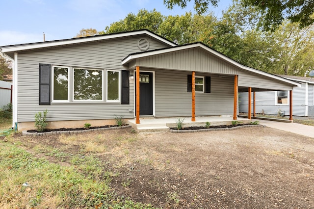 ranch-style home with covered porch