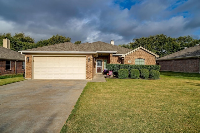 ranch-style house featuring a garage and a front yard