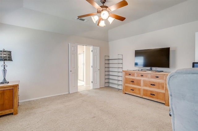 interior space with ceiling fan