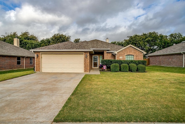 single story home with a garage and a front yard