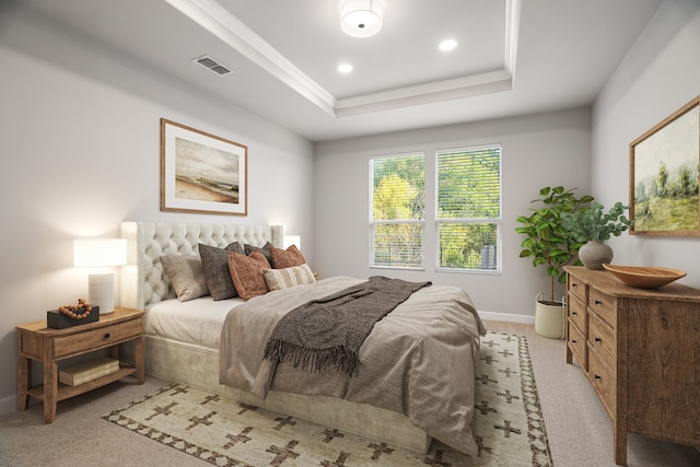 bedroom with light carpet and a raised ceiling