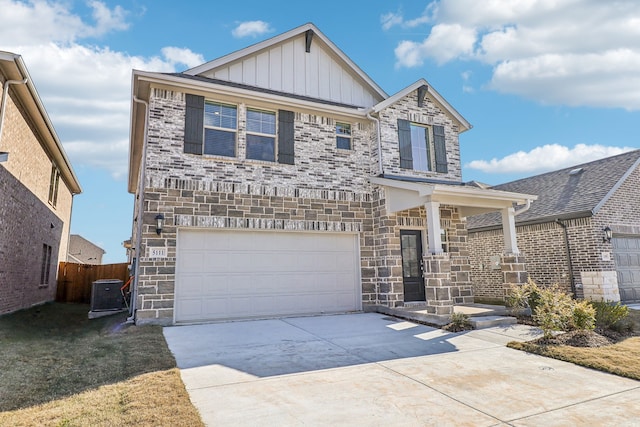 view of front of home featuring central AC unit and a garage