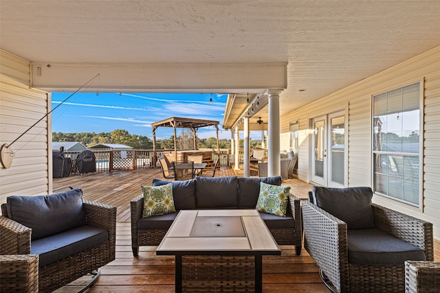 wooden deck featuring an outdoor living space