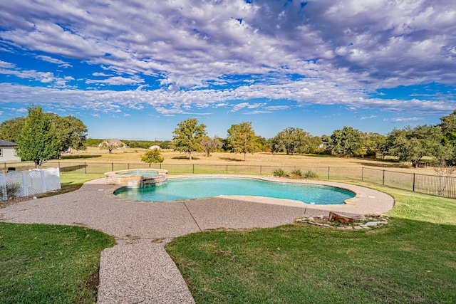 view of swimming pool with a yard and an in ground hot tub