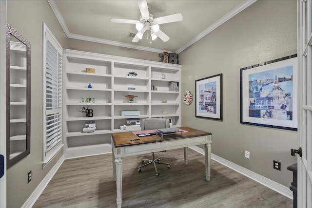 home office with ceiling fan, wood-type flooring, and ornamental molding