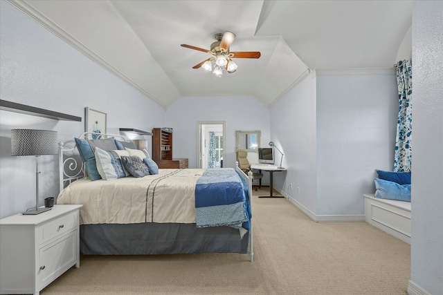 carpeted bedroom with ceiling fan, crown molding, and vaulted ceiling