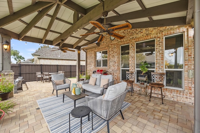 view of patio / terrace with a grill, ceiling fan, an outdoor hangout area, and a gazebo