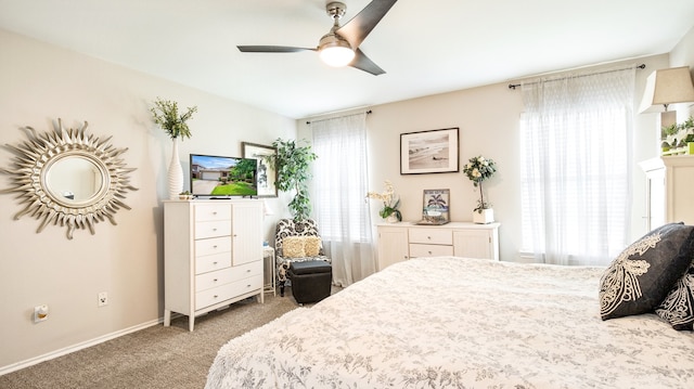 bedroom with light colored carpet and ceiling fan