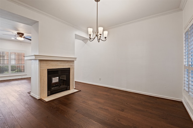 unfurnished living room featuring dark wood-type flooring, ceiling fan with notable chandelier, and crown molding