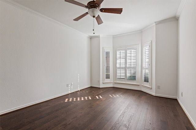 empty room with dark hardwood / wood-style floors, crown molding, and ceiling fan