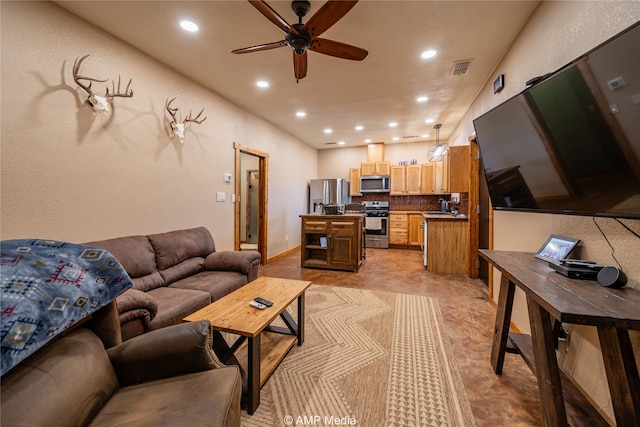 living room with ceiling fan