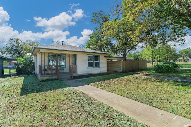 view of front of home with a front lawn and a porch