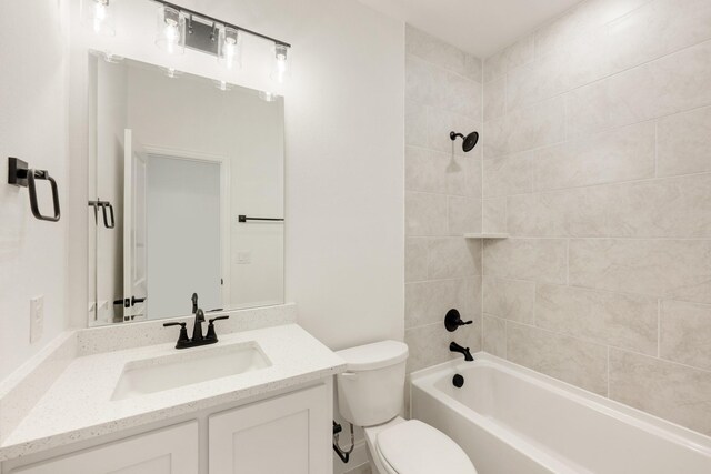 carpeted spare room with lofted ceiling, visible vents, baseboards, and a ceiling fan