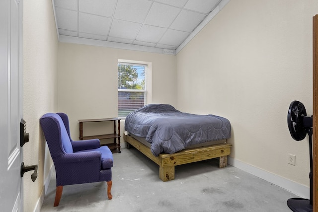 bedroom featuring a paneled ceiling