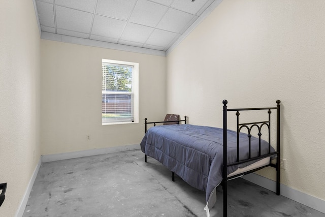 bedroom featuring a drop ceiling