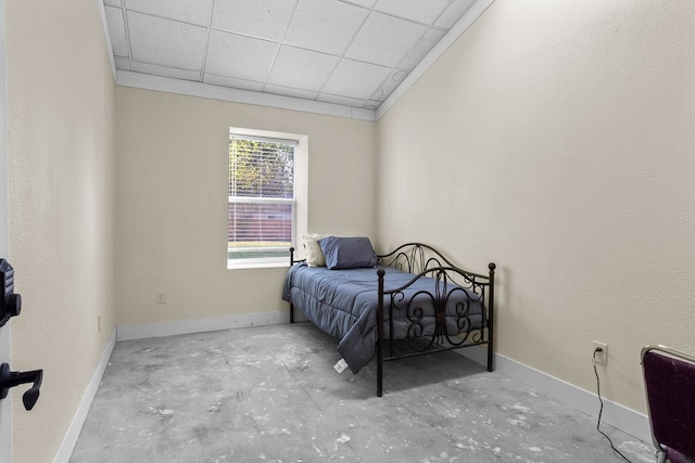 bedroom with a drop ceiling