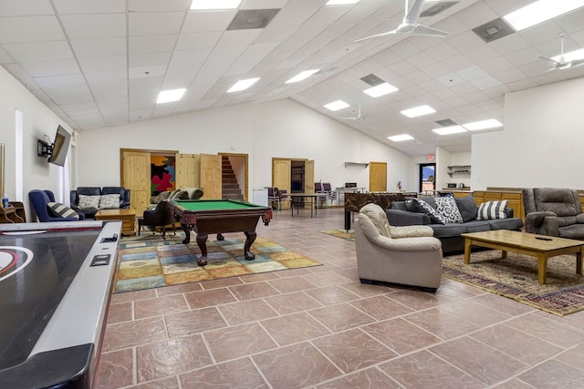 recreation room featuring billiards, high vaulted ceiling, and a drop ceiling