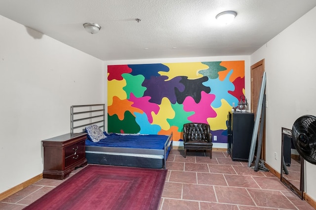 bedroom with a textured ceiling