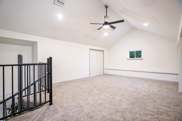 bonus room with carpet flooring, ceiling fan, vaulted ceiling, and a baseboard heating unit