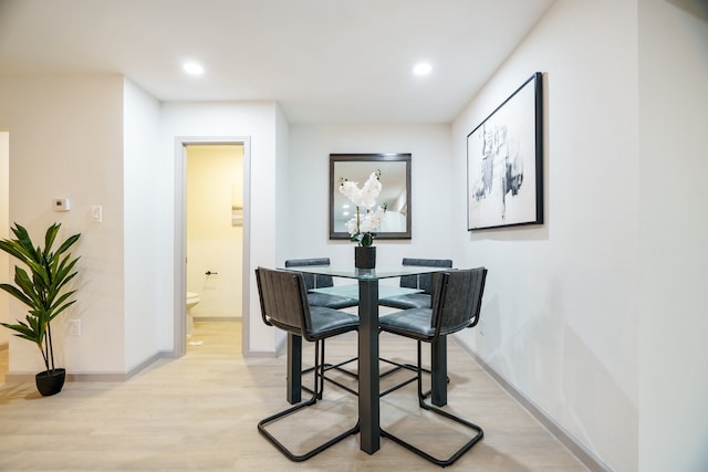 dining area featuring light hardwood / wood-style floors