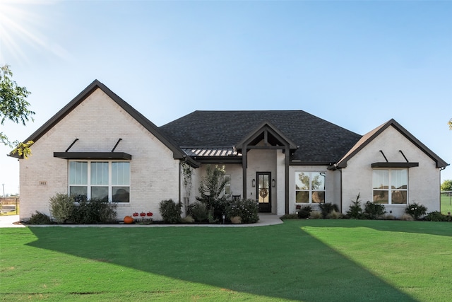 view of front of home with a front yard