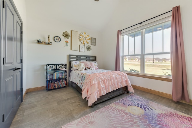 bedroom with light hardwood / wood-style flooring