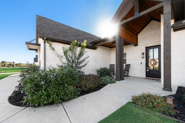 doorway to property featuring a porch