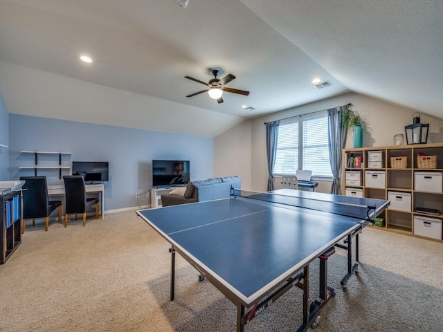 rec room with carpet floors, ceiling fan, and lofted ceiling