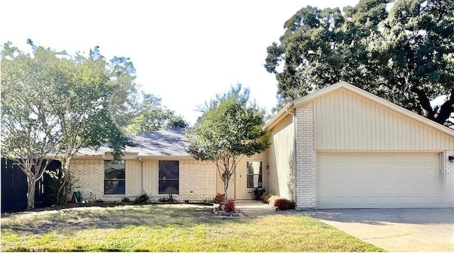 ranch-style house with a garage and a front yard