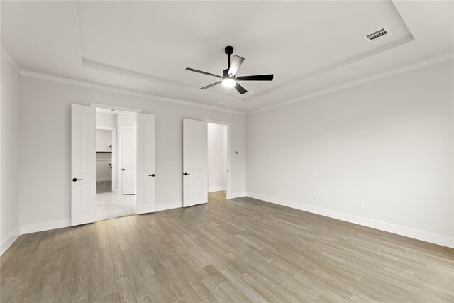 unfurnished dining area featuring a chandelier and light hardwood / wood-style floors