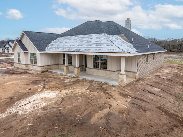 rear view of property with a patio