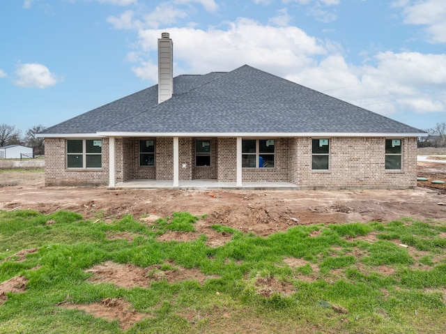 rear view of house featuring a patio area