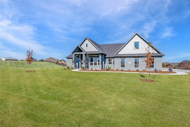 craftsman house with a front lawn