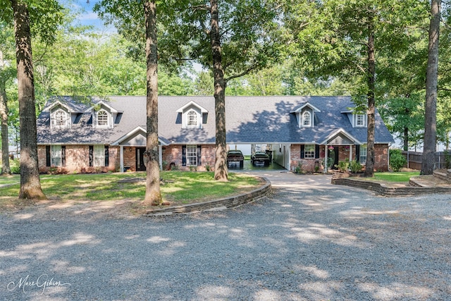 new england style home with a carport