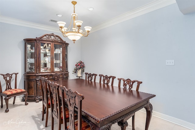 dining area featuring a notable chandelier and crown molding