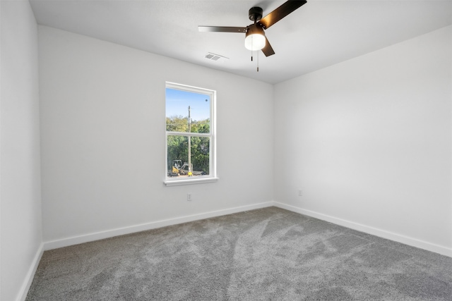 carpeted empty room with ceiling fan