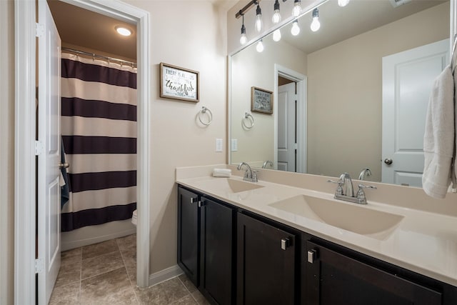 317 St Paul Ct, Heath, TX 75126 - bathroom with double vanity, baseboards, curtained shower, and toilet
