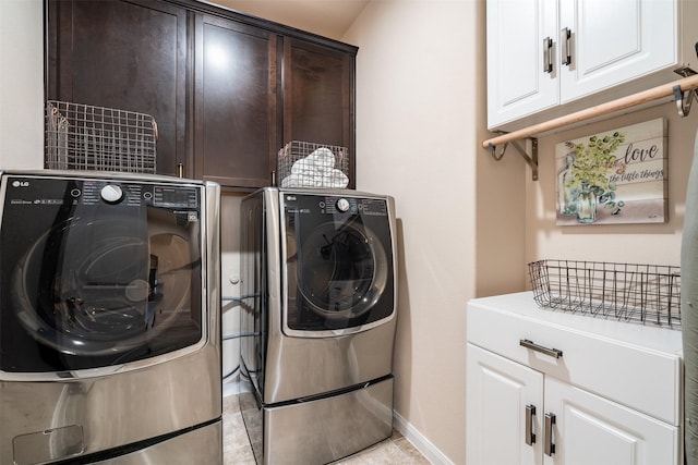 317 St Paul Ct, Heath, TX 75126 - laundry area with cabinet space, washer and clothes dryer, baseboards, and light tile patterned flooring
