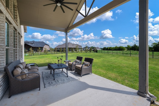 view of patio featuring ceiling fan and an outdoor living space