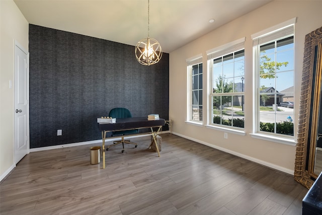 office area featuring hardwood / wood-style floors, a chandelier, and a healthy amount of sunlight