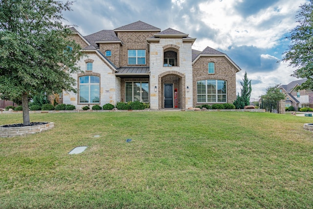 view of front facade with a front lawn