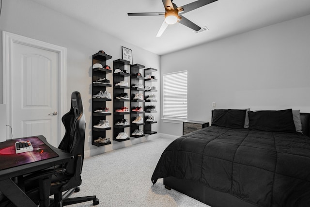 carpeted bedroom featuring ceiling fan