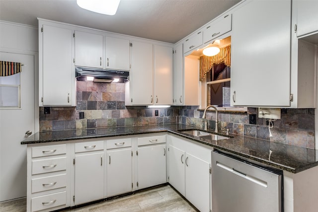 kitchen with white cabinets, black electric stovetop, stainless steel dishwasher, and sink