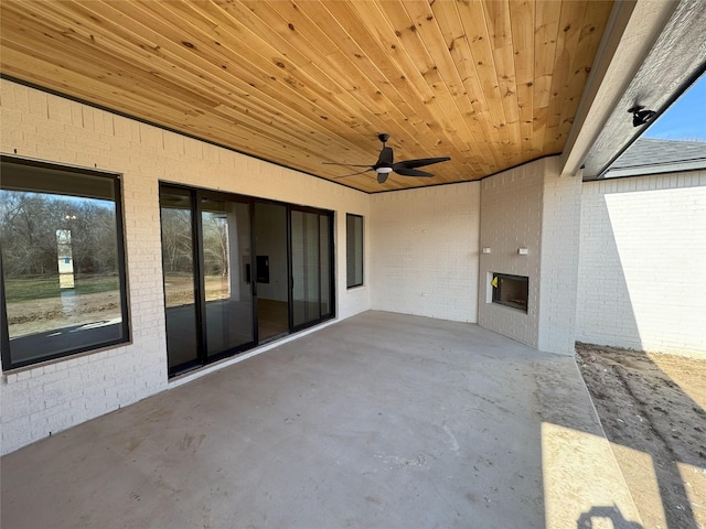 view of patio / terrace featuring ceiling fan