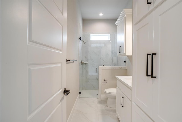 full bath with toilet, marble finish floor, recessed lighting, a marble finish shower, and vanity