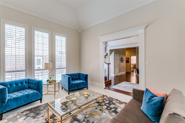 living room with dark wood-type flooring and ornamental molding