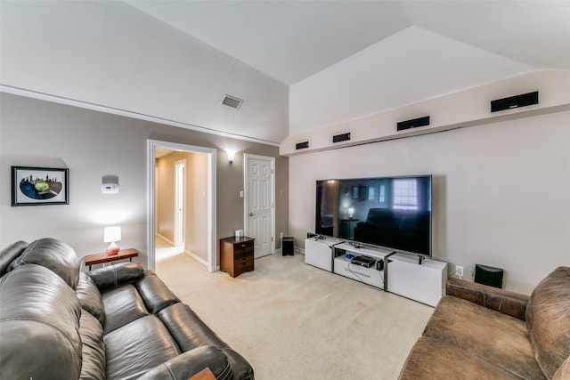 living room with light colored carpet and vaulted ceiling